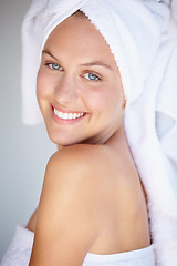 Image showing Portrait of happy woman, natural beauty or towel for wellness in house bathroom for glow. Morning, detox or confident female model with skincare results, self care or healthy skin for dermatology