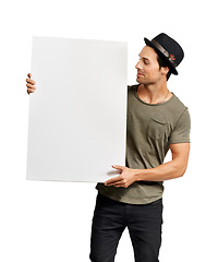 Image showing Poster, mockup and information with a hipster man in studio isolated on a white background for marketing. Space, sign or placard with a confident young person holding a billboard for an announcement