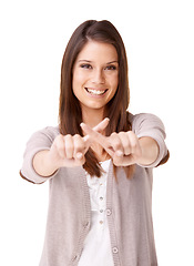 Image showing Portrait of woman with smile, no hand gesture or warning to stop with confidence isolated on white background. X finger, cross and happy model girl with sign for wrong, rejection or blocked in studio
