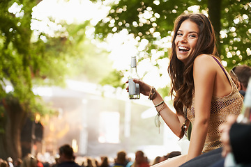 Image showing Happy woman, portrait or laughing with drink at music festival, event or outdoor party in nature. Female person smile with alcohol enjoying sound or DJ performance at concert, carnival or summer fest