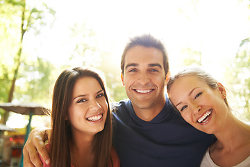 Image showing Man, woman and friends or portrait in nature for adventure holiday, environment vacation or hug. Group, face and smile in forest for embrace happiness or explore outside, celebrate or bonding fun