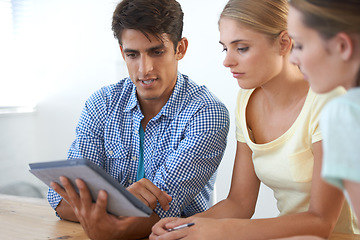 Image showing Business people, collaboration and reading on tablet for meeting, office planning and teamwork or research. Young man, women or team with digital technology, marketing ideas or social media startup