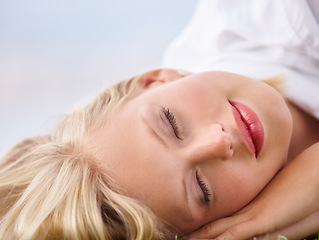 Image showing Peace, sleep and face of woman outdoor with wellness nap, rest or break closeup. Relax, dreaming and tired female person sleeping outside, calm or enjoying quiet moment, me time or day off chilling