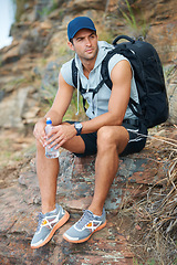 Image showing Thinking, person or relax in nature hiking with backpack for workout, training or exercise view. Hiker, man or planning on mountains rest for health, wellness or sports vision in Brazil summer break