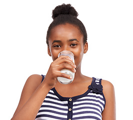 Image showing Portrait, wellness and black woman drinking milk, healthy diet or calcium isolated on white studio background. Face, African person or model with a glass, nutrition or organic dairy with mockup space