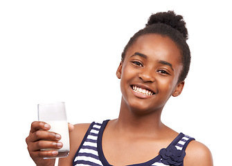 Image showing Portrait, smile and black woman drinking milk, healthy diet and wellness isolated on a white studio background. Face, African person or model with a glass, calcium and organic dairy with mockup space