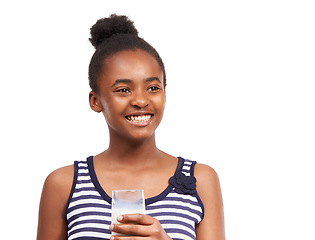 Image showing Thinking, smile and girl with a glass of milk, nutrition or wellness isolated on white studio background. African person, mockup space or model with calcium, diet plan or healthy with idea or natural