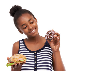 Image showing Black girl, decision and donut with sandwich, smile and nutrition isolated on a white studio background. African person, mockup space and model with sweet snack, choice and comparison with wellness