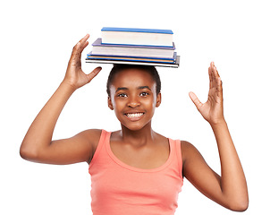 Image showing Portrait, happy and black girl with books on her head, education and balance isolated on white studio background. Face, African person and model with mockup space and learning with knowledge or smile