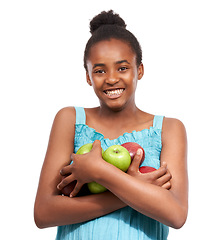 Image showing Portrait, girl and child with nutrition, apples and smile isolated on a white studio background. Face, African person and model with organic fruit, healthy snack and wellness with diet, happy and kid