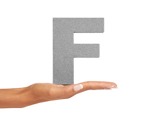 Image showing Hands, person and capital letter F in studio for alphabet, fonts or learning english language on white background. Closeup, text design and typography character for grammar sign, teaching or spelling