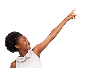 Image showing Smile, pointing and portrait of black girl in studio with mockup space for marketing or advertising. Happy, sale and gen z African child with positive face expression isolated by white background.