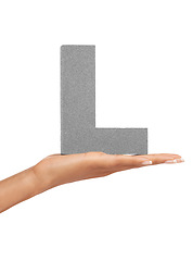 Image showing Alphabet, hand and L font in studio for advertising, learning or teaching presentation. Sign, letter or character for marketing, text or communication and grammar or symbol on white background