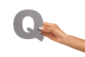 Image showing Hand, capital letter and spelling q in studio and education or alphabet by white background. Text, language and learning or font in mockup, words and knowledge or development, literacy and english