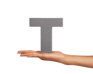 Image showing Woman, hand and letter T or alphabet in studio for advertising, learning and teaching presentation. Sign, font and character for text and communication or grammar and symbol on white background