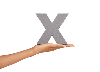 Image showing Woman, hand and x letter or alphabet in studio for marketing, learning or teaching on mock up. Sign, font or character for marketing, text or communication and grammar or symbol on white background