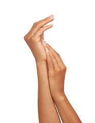 Image showing Woman, hand and palm in studio with skincare for cosmetics, manicure and nail treatment for wellness. Person, fingers or mock up space for cosmetology, moisturiser and smooth skin on white background