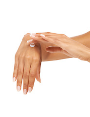 Image showing Woman, hands or cream in studio with skincare for cosmetics, manicure or nail treatment for wellness. Person, fingers or mock up space for cosmetology, moisturiser and smooth skin on white background