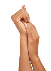 Image showing Woman, hand and nails in studio with manicure for cosmetics, skincare or nail treatment for wellness. Person, fingers or mock up space for cosmetology, moisturiser and smooth skin on white background