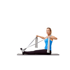 Image showing Fitness, resistance band and portrait of woman doing exercise in studio for health, wellness and bodycare. Sport, yoga mat and person from Canada with arm workout or training by white background.