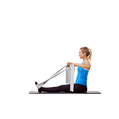 Image showing Fitness, resistance band and woman doing exercise in studio for health, wellness and bodycare. Sport, yoga mat and young female person from Australia with arms workout or training by white background