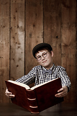 Image showing Education portrait, book and young child reading information, literature story or studying. Mockup knowledge space, textbook and happy kid student with academic learning, literacy or history homework