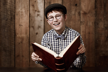 Image showing Learning portrait, book or young happy child, learner or pupil reading information, literature story or studying. Knowledge textbook, happiness or kid student education, literacy or research homework