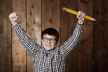 Image showing Education, pencil and excited child celebrate winning scholarship prize, learning achievement or knowledge success. Stationary, celebration cheers or young youth kid, student or winner of competition