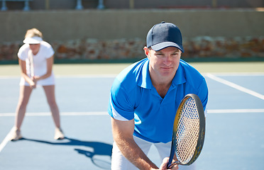 Image showing Tennis match, couple and sports in outdoors, competition and playing on court at country club. People, training and exercise or ready for game, performance and practice or collaboration for challenge