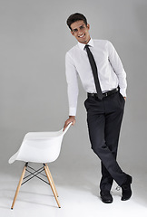 Image showing Shirt, tie and portrait of businessman with chair in studio, grey background and mock up space. Confident, man and opportunity for worker to interview for a professional job with happiness and pride