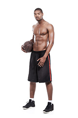 Image showing Fitness, gym and portrait of black man with basketball, six pack and shirtless for body muscle workout. Sports wellness, health and serious professional athlete with ball isolated on white background