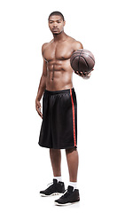 Image showing Fitness, body and black man with basketball, six pack and shirtless for muscle workout, game or challenge. Sports wellness, health and professional athlete with ball isolated on white background.