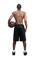 Image showing Man, basketball player and standing for training, back and shirtless on white background, confident and game. Studio backdrop, fit and sportsman for exercise, health and african active athlete