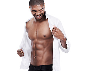 Image showing Man, fashion and muscle with abs, sexy and dressing for chest, african and male model in white background. Alone, smile and happy with six pack, shirt and corporate wear, stylish and masculine