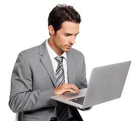 Image showing Business man, laptop and typing in studio for online report, stock market information or review update of digital trading on white background. Serious corporate trader, broker or research on computer