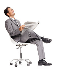 Image showing Business man, laughing and reading newspaper in studio, headlines and information on current events. Businessperson, happy and knowledge or announcement on paper, news and update by white background