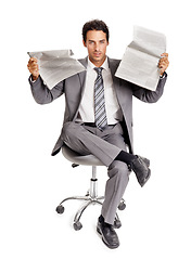 Image showing Business man, portrait and reading newspaper in studio, headlines and information on current events. Businessperson, face and knowledge or announcement on paper, news and update by white background