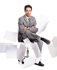 Image showing Portrait, serious and business man with documents isolated on white studio background. Paperwork in air and professional relax on chair and arms crossed in stress, confidence or accountant in chaos