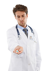 Image showing Doctor, man and prescription of pills in studio, wellness medication and healthcare in pharmaceuticals. Pharmacist, face and serious in medicine support, advice tablets and drugs by white background