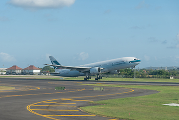 Image showing Cathay Pacific Boeing 777 taking off in Bali