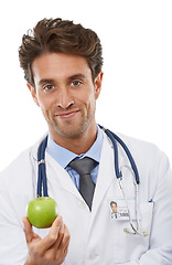 Image showing Doctor, man and portrait in studio with apple and advice in healthcare for health diet in medicine. Nutritionist, face and fruit for wellness in vitamins, care and natural food by white background