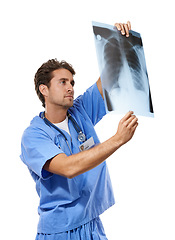 Image showing Doctor, man and radiologist by xray in studio, surgery analysis and chest chart for thinking in mockup. Specialist, planning and lungs radiograph for asthma disease and ribs mri by white background