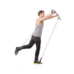 Image showing Fitness, gym and resistance band with a young man in studio isolated on a white background for health. Workout, exercise or performance and a strong athlete training with equipment for wellness