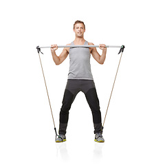 Image showing Portrait, fitness and resistance band with a young man in studio isolated on a white background for health. Workout, exercise or wellness and a strong athlete training with equipment at the gym
