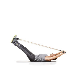 Image showing Exercise, man and resistance band with fitness, training and wellness isolated on white studio background. Mockup space, person and model with workout, healthy and progress with energy and endurance