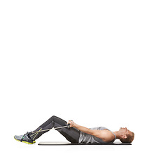 Image showing Exercise, man and resistance band with training, stretching and healthy isolated on white studio background. Mockup space, person and model with workout, wellness or progress with energy or endurance