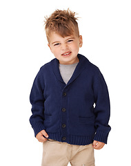 Image showing Portrait, cute and young kid in studio isolated on a white background in Australia. Face, child and adorable boy standing in casual clothes, fashion and confident model, preschooler and schoolchild