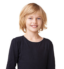 Image showing Portrait, fashion and youth with a blonde girl in studio isolated on a white background for style. Smile, kids and confident a happy young child model in a casual, trendy or relaxed clothes outfit