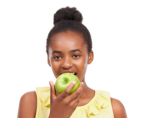 Image showing Eating, wellness and portrait of girl and apple in studio for nutrition, health and diet. Food, self care and vitamin c with face of African teenage child and fruit on white background with a smile