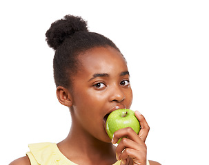 Image showing Eating, health and portrait of girl and apple in studio for nutrition, wellness or diet. Food, self care and vitamin c with face of African student and fruit on white background for fiber and balance